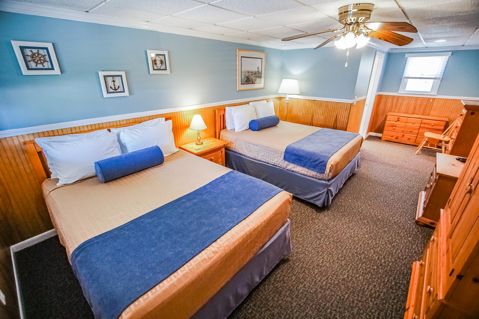 A spacious accommodation with double beds at VRI's Island Manor Resort in Rhode Island.